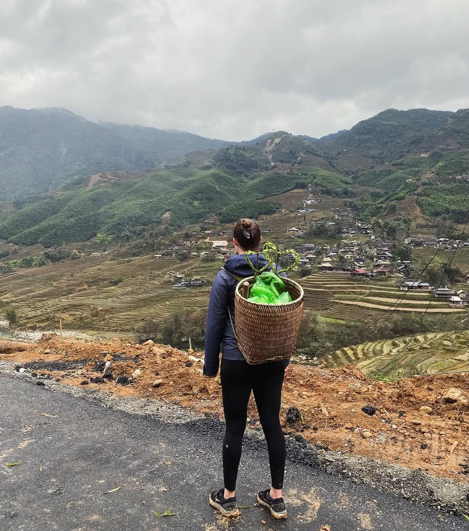 Ri Ri looking out over terraced valleys in northern Vietnam